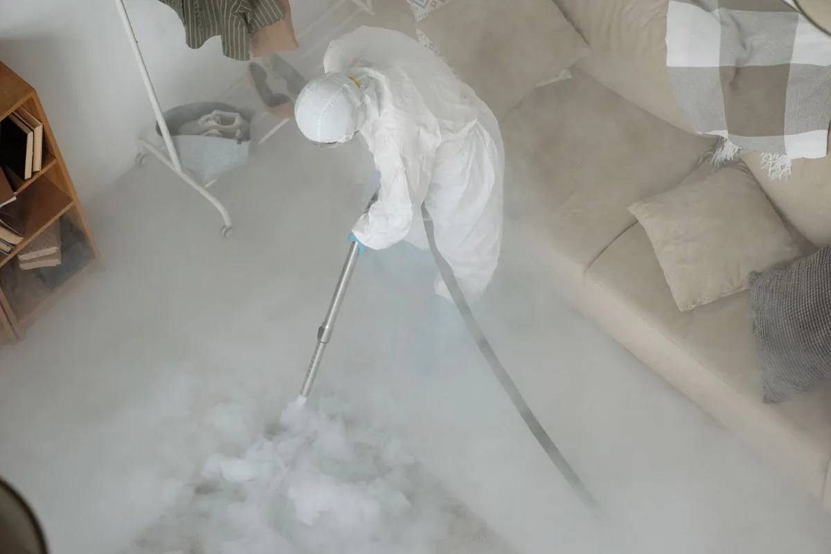 Biohazard cleanup technician in protective equipment, Roaring Spring, PA